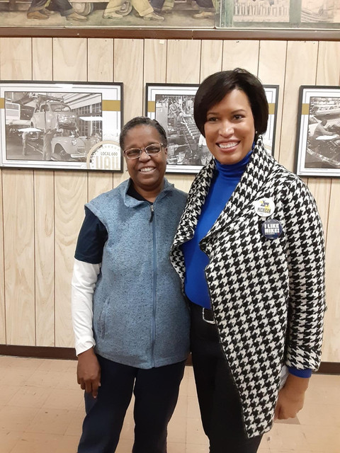 Carol with a community member